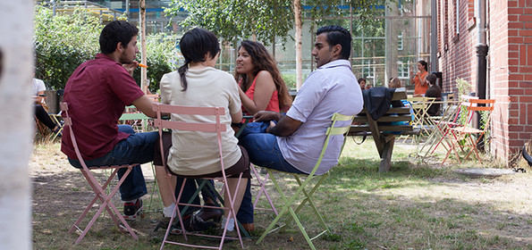 Students enjoying a break outside the main lecture hall